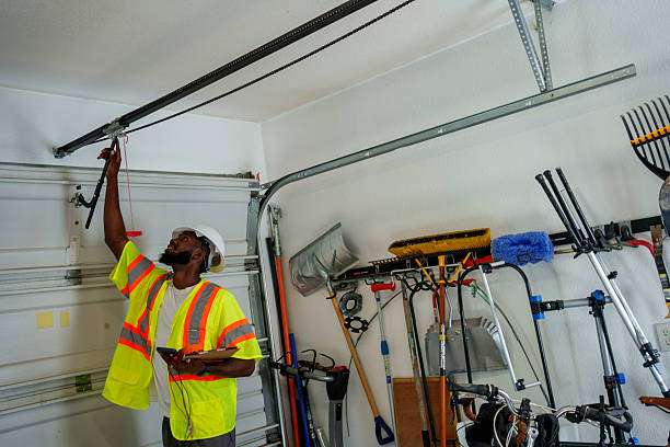 Professional Garage Door technician working in Creve Coeur, IL